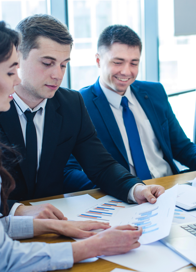 Business meeting discussing retention strategies